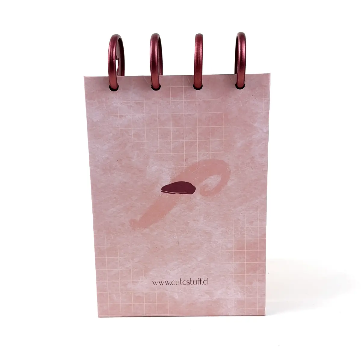 Libreta A6 Clarity rosada con frase manuscrita y discos superiores
