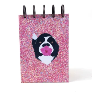 Libreta B6 Bloom rosada con efecto glitter y perrito con flor