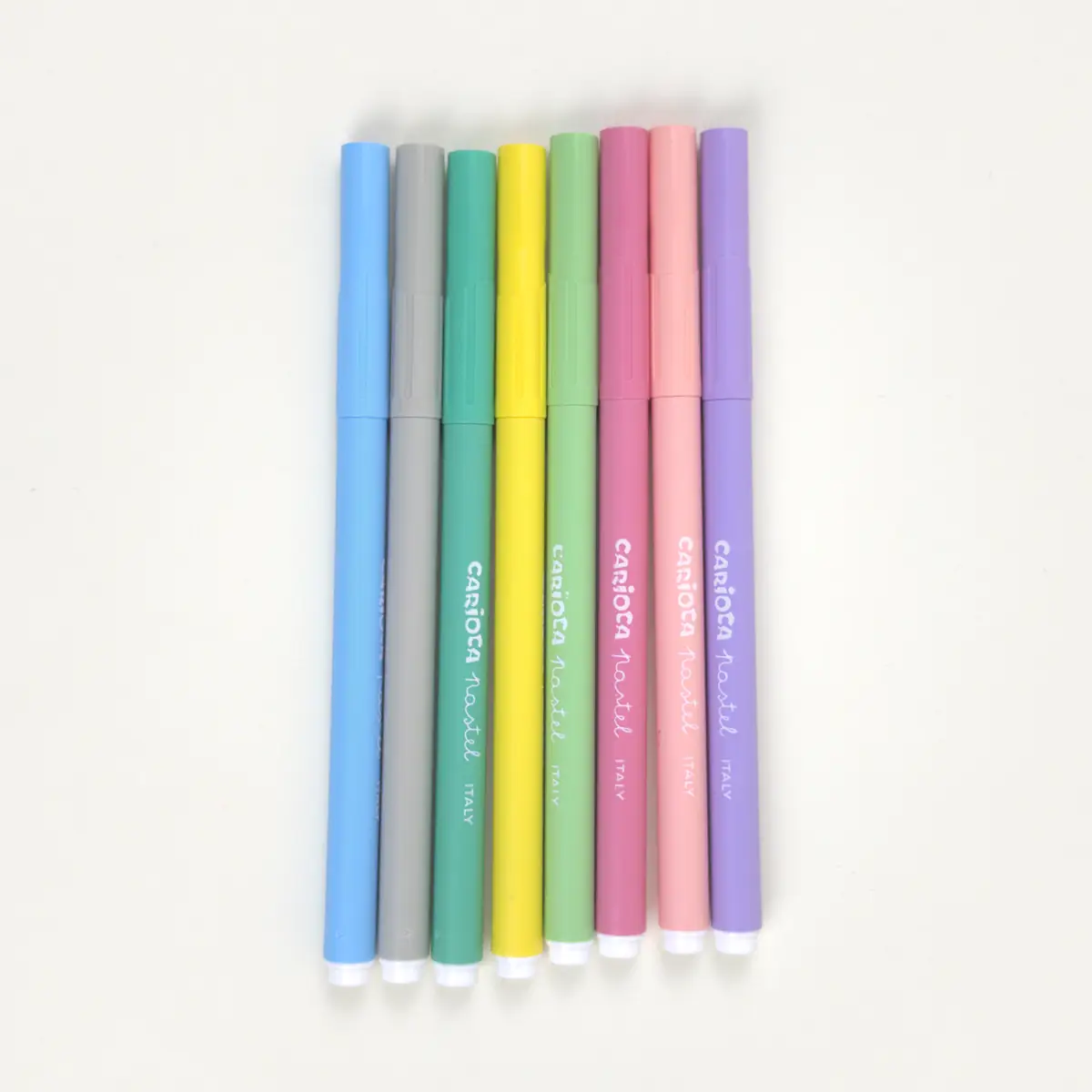 Ocho marcadores Carioca Pastel fuera del envase